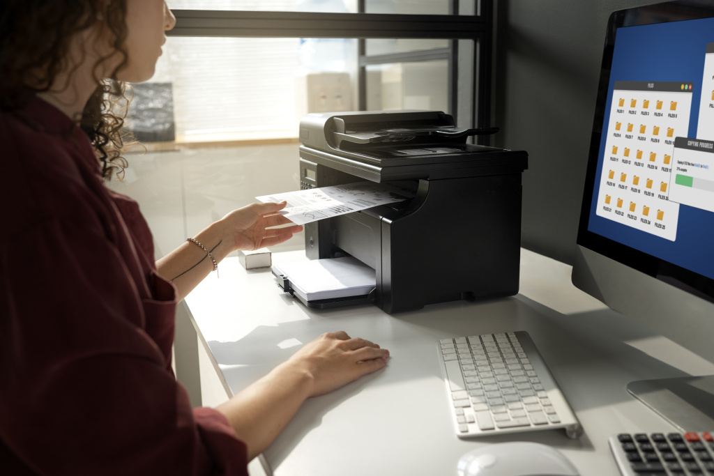 side-view-woman-working-with-printer.jpg